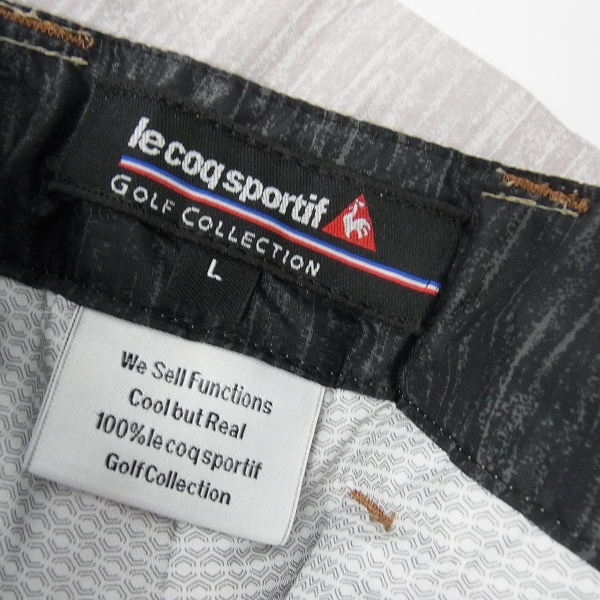 実際に弊社で買取させて頂いたle coq sportif/ルコック ゴルフウェア 中綿ナイロン パンツ 防寒 裾アジャスター グレー系 L 2点セットの画像 2枚目
