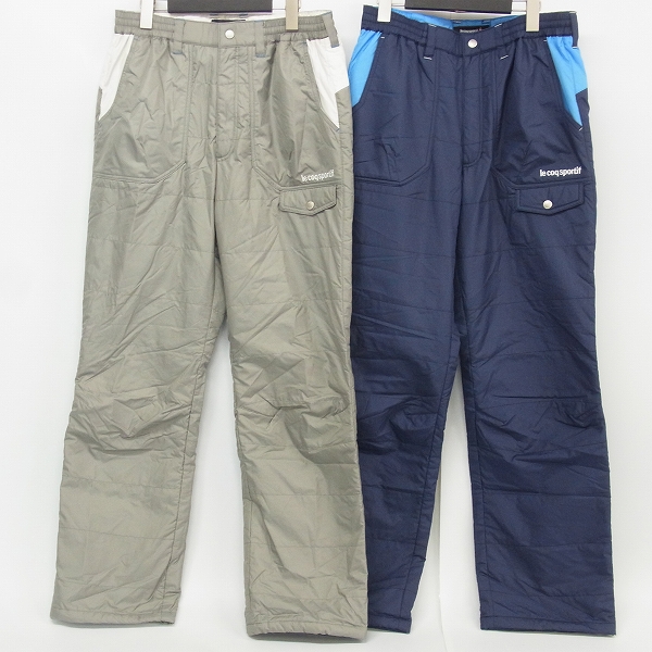 実際に弊社で買取させて頂いたle coq sportif/ルコック ゴルフウェア 中綿ナイロン パンツ 防寒 裾アジャスター ライトグレー/ネイビー L 2点セット