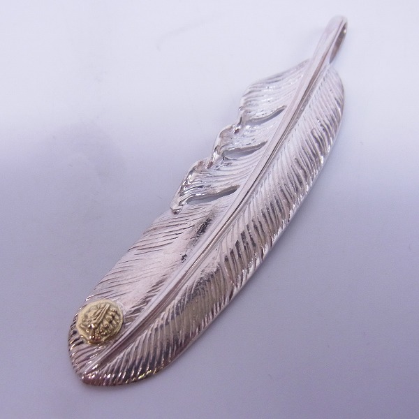 実際に弊社で買取させて頂いたTADY&KING/タディ&キング GPインディアン付き特大フェザー SV925×K18 左向きの画像 0枚目