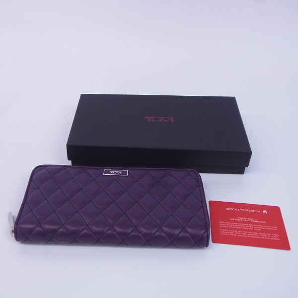 TUMI/トゥミ ラウンドジップウォレット/長財布 キルティング 紫の買取 