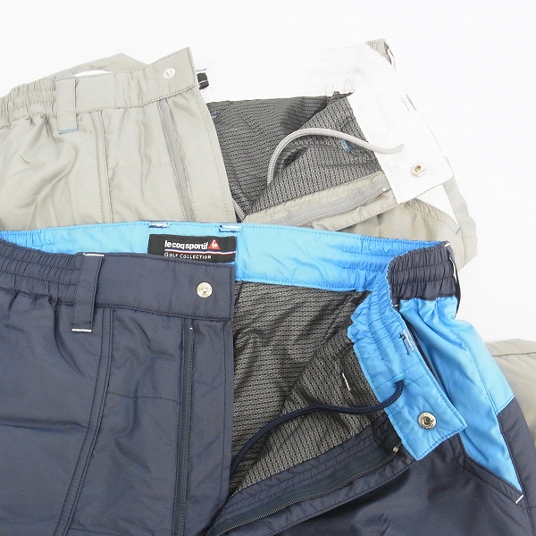 実際に弊社で買取させて頂いたle coq sportif/ルコック ゴルフウェア 中綿ナイロン パンツ 防寒 裾アジャスター ライトグレー/ネイビー L 2点セットの画像 2枚目
