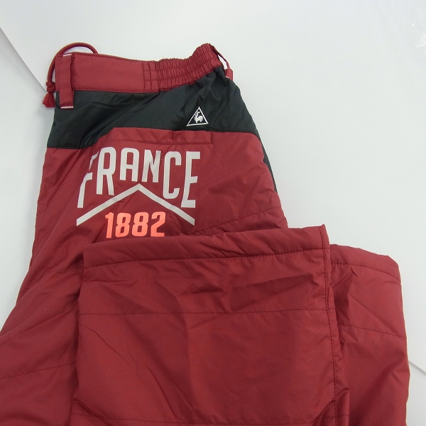 実際に弊社で買取させて頂いたle coq sportif/ルコック ゴルフウェア 中綿ナイロン パンツ 防寒 裾アジャスター ブラック/レッド L 2点セットの画像 5枚目