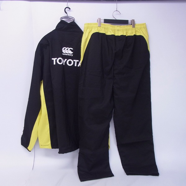 実際に弊社で買取させて頂いた【未使用】CANTERBURY/カンタベリー トヨタ自動車ヴェルブリッツ 上下セットアップ 黒/6Lの画像 1枚目