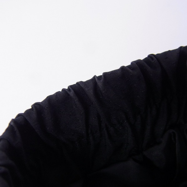 実際に弊社で買取させて頂いたFILA/フィラ ゴルフウェア 中綿上下セット ブラック Lサイズの画像 5枚目