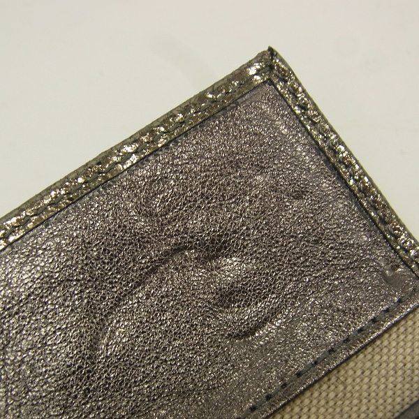 実際に弊社で買取させて頂いたJIMMY CHOO/ジミーチュウ スタッズ 6連キーケースの画像 8枚目