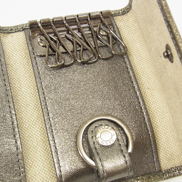 実際に弊社で買取させて頂いたJIMMY CHOO/ジミーチュウ スタッズ 6連キーケースの画像 4枚目