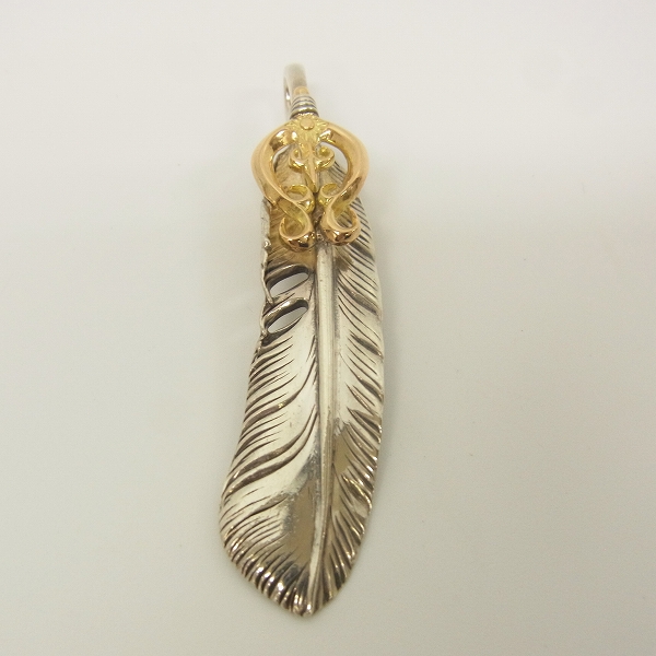 実際に弊社で買取させて頂いたARIZONA FREEDOM/アリゾナフリーダム 60mm K18 ループ付 フェザーペンダント/左向きの画像 1枚目