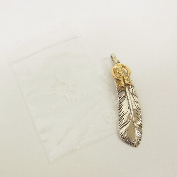 実際に弊社で買取させて頂いたARIZONA FREEDOM/アリゾナフリーダム 60mm K18 ループ付 フェザーペンダント/左向きの画像 5枚目