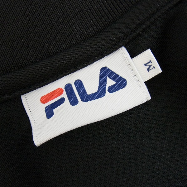実際に弊社で買取させて頂いたFILA/フィラ トラックジャケット ゴールド×ブラック ラメ入り FM6476/Mの画像 2枚目