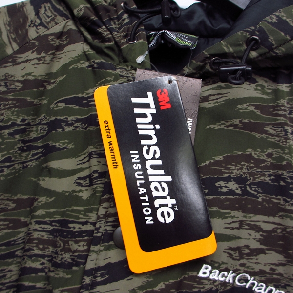 実際に弊社で買取させて頂いた【未使用】BACK CHANNEL/バックチャンネル HOODED WINDBREAKER ナイロン中綿フードジャケット カモ柄 Sの画像 4枚目