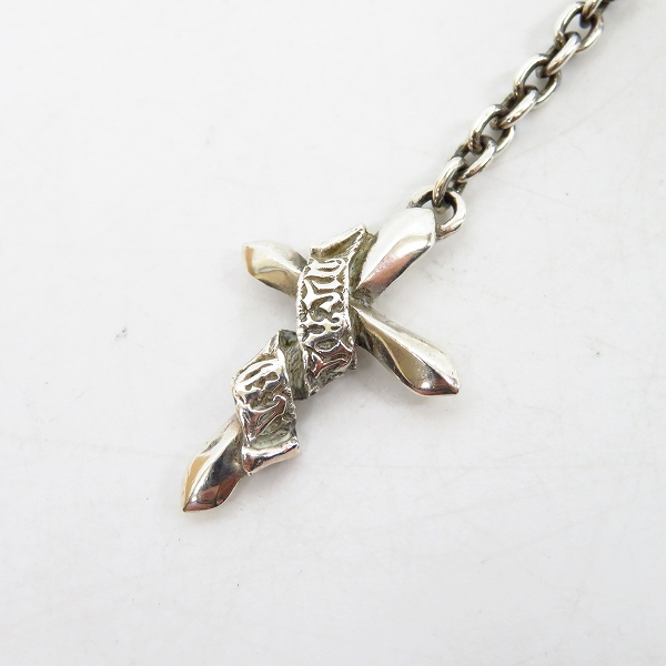 実際に弊社で買取させて頂いたDEAL DESIGN/ディールデザイン SNAKED LOWS/スネイキッドロウズ クロスネックレスの画像 1枚目