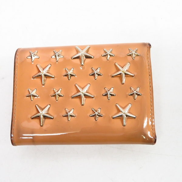 実際に弊社で買取させて頂いたJIMMY CHOO/ジミーチュウ NEMO 133NEMOGTR エナメル/スタッズ 3つ折り財布の画像 1枚目