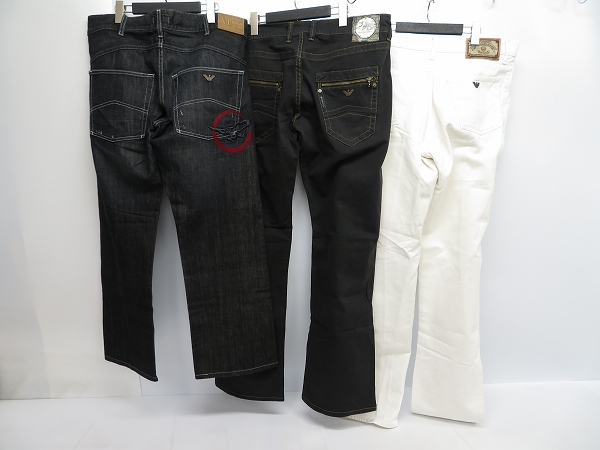 実際に弊社で買取させて頂いたARMANI JEANS/アルマーニジーンズ エンブレムメタル/COMFORT FIT 等 コットン/デニム パンツ 34/38 3点セットの画像 1枚目