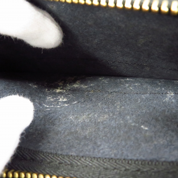 実際に弊社で買取させて頂いたHTC/エイチティーシー フラワースタッズ カモ柄 レザーロングウォレット/長財布の画像 4枚目