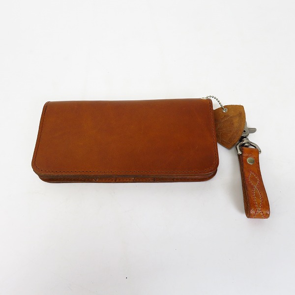 実際に弊社で買取させて頂いたHTC/エイチティーシー スタッズ レザーロングウォレット/長財布 ブラウンの画像 1枚目