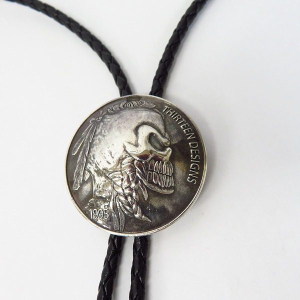 実際に弊社で買取させて頂いたTHIRTEEN DESIGNS/サーティーンデザインズ/13デザインズ スカルコイン ループタイ/ボロタイの画像 1枚目