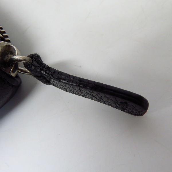 実際に弊社で買取させて頂いたJIMMY CHOO/ジミーチュウ スターエンボス レザー ラウンドジップ ウォレット/長財布の画像 5枚目