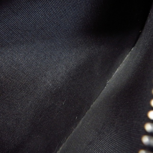 実際に弊社で買取させて頂いたJIMMY CHOO/ジミーチュウ スターエンボス レザー ラウンドジップ ウォレット/長財布の画像 6枚目