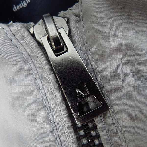 実際に弊社で買取させて頂いた【国内正規】ARMANI JEANS/アルマーニジーンズ バックロゴ ナイロンブルゾン 48の画像 7枚目