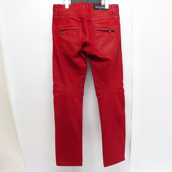 実際に弊社で買取させて頂いたBALMAIN/バルマン バイカーパンツ/コーティングパンツ レッド 28の画像 1枚目