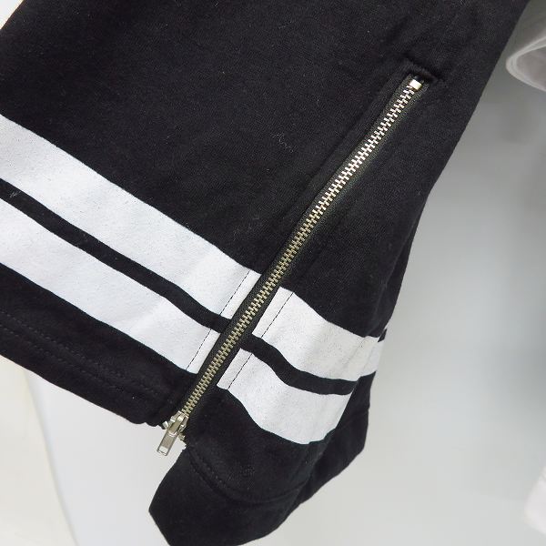 実際に弊社で買取させて頂いたFILA/フィラ ロゴ刺繍/サイドジップ ハーフスリーブ/半袖 カットソー/Tシャツ ホワイト/ブラック 2点セットの画像 3枚目