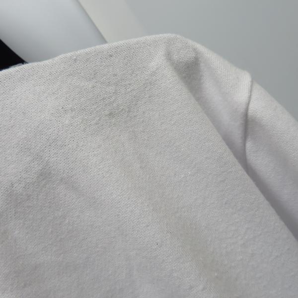 実際に弊社で買取させて頂いたFILA/フィラ ロゴ刺繍/サイドジップ ハーフスリーブ/半袖 カットソー/Tシャツ ホワイト/ブラック 2点セットの画像 5枚目