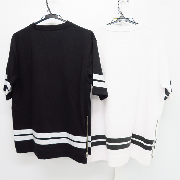 実際に弊社で買取させて頂いたFILA/フィラ ロゴ刺繍/サイドジップ ハーフスリーブ/半袖 カットソー/Tシャツ ホワイト/ブラック 2点セットの画像 1枚目