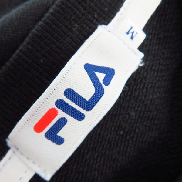 実際に弊社で買取させて頂いたFILA/フィラ ロゴ刺繍/サイドジップ ハーフスリーブ/半袖 カットソー/Tシャツ ホワイト/ブラック 2点セットの画像 2枚目