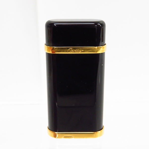 実際に弊社で買取させて頂いたCartier/カルティエ ガスライター ブラック×ゴールドの画像 1枚目