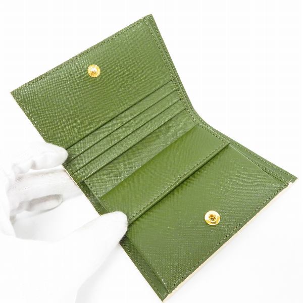 実際に弊社で買取させて頂いたMARNI/マルニ VANITOSI レザー 3トーン 2つ折り財布/ウォレットの画像 3枚目