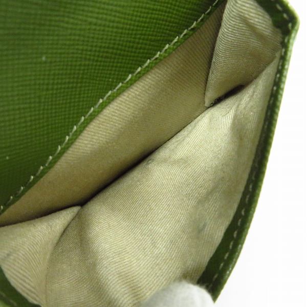 実際に弊社で買取させて頂いたMARNI/マルニ VANITOSI レザー 3トーン 2つ折り財布/ウォレットの画像 4枚目