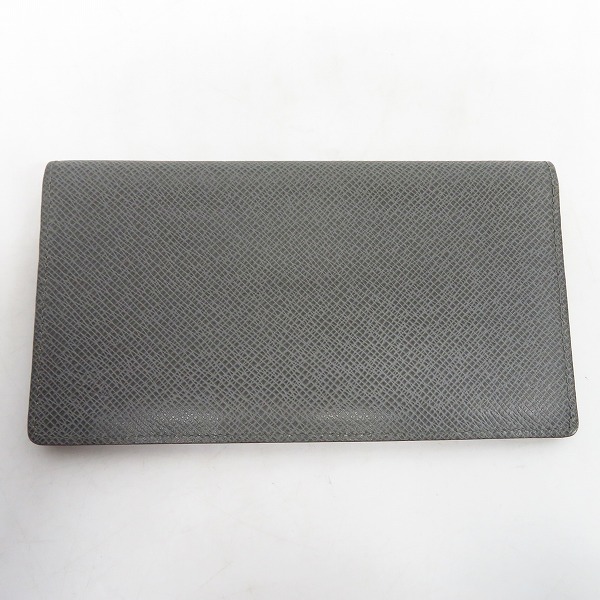 実際に弊社で買取させて頂いたLOUIS VUITTON/ルイヴィトン ポルトフォイユ ロン タイガ グラシエ 二つ折り長財布  M32644 イニシャル入りの画像 0枚目