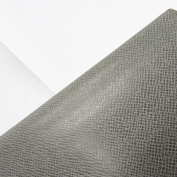 実際に弊社で買取させて頂いたLOUIS VUITTON/ルイヴィトン ポルトフォイユ ロン タイガ グラシエ 二つ折り長財布  M32644 イニシャル入りの画像 7枚目