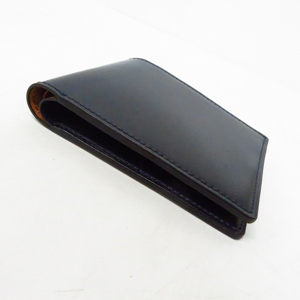 実際に弊社で買取させて頂いたBARNEYS NEWYORK/バーニーズニューヨーク コードバン 二つ折り財布の画像 2枚目