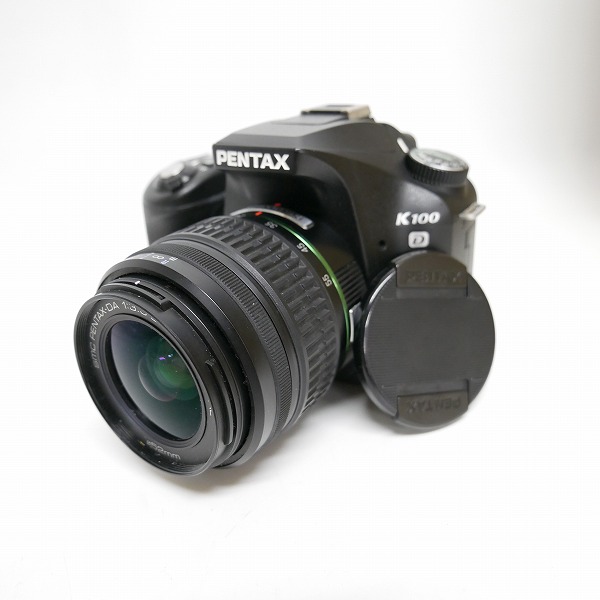 実際に弊社で買取させて頂いた【簡易動作確認済】PENTAX/ペンタックス K100 D SR レンズ SMC PENTAX-DA 1:3.5-5.6 18-55mm AL 単3電池駆動の画像 0枚目