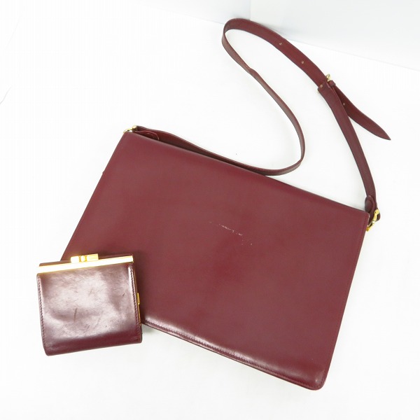 実際に弊社で買取させて頂いたCartier/カルティエ ロゴ マストライン レザー ショルダーバッグ ボルドー/レザー がま口三つ折り財布 ボルドー 2点セットの画像 3枚目