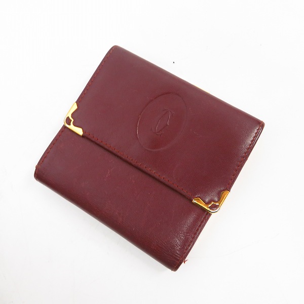 実際に弊社で買取させて頂いたCartier/カルティエ ロゴ マストライン レザー ショルダーバッグ ボルドー/レザー がま口三つ折り財布 ボルドー 2点セットの画像 2枚目