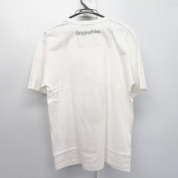 実際に弊社で買取させて頂いた【未使用】KAWS×Original Fake/カウズ×オリジナルフェイク ロケットデザイン Tシャツ 3の画像 1枚目