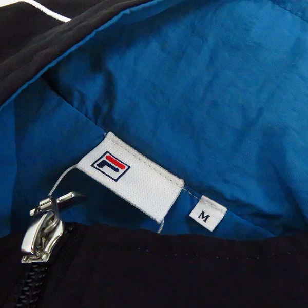 実際に弊社で買取させて頂いた【未使用】FILA/フィラ ライトオン40th記念別注モデル 切替ナイロンジャケット/FM9496/Mの画像 2枚目