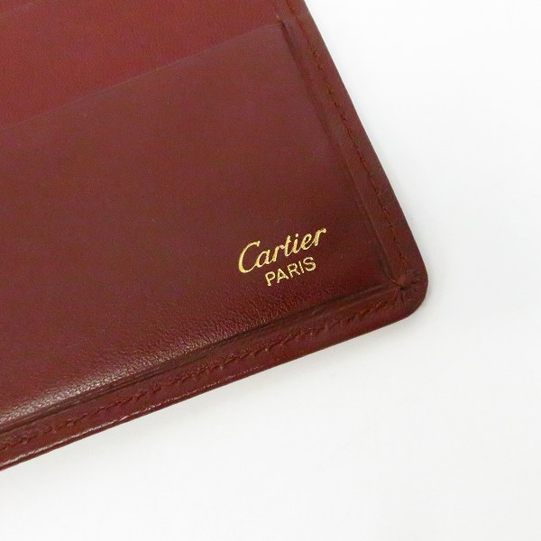 実際に弊社で買取させて頂いたCartier/カルティエ マストライン ロゴ レザー 2つ折り長財布の画像 3枚目