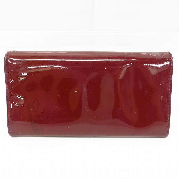 実際に弊社で買取させて頂いた【難有り】Christian Dior/クリスチャン・ディオール ロゴプレート エナメル 二つ折り長財布の画像 1枚目