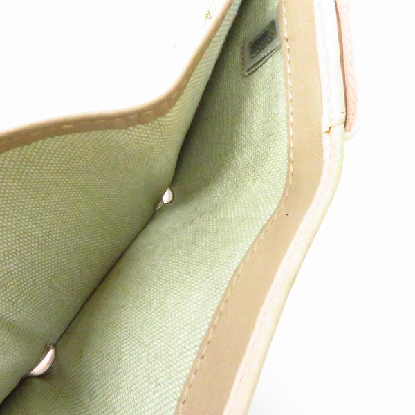 実際に弊社で買取させて頂いたJIMMY CHOO/ジミーチュウ スタースタッズ レザー 三つ折りコンパクト財布の画像 5枚目