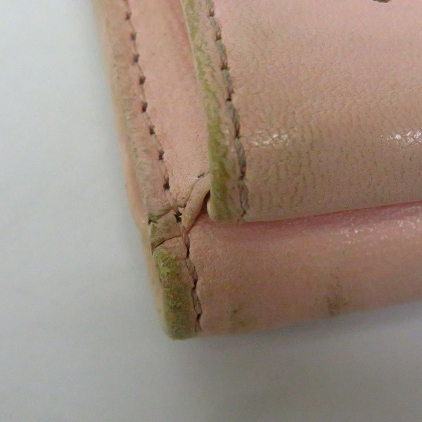 実際に弊社で買取させて頂いたJIMMY CHOO/ジミーチュウ スタースタッズ レザー 三つ折りコンパクト財布の画像 8枚目