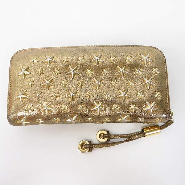 実際に弊社で買取させて頂いたJIMMY CHOO/ジミーチュウ スタースタッズ レザー ラウンドファスナー長財布 ゴールドの画像 1枚目
