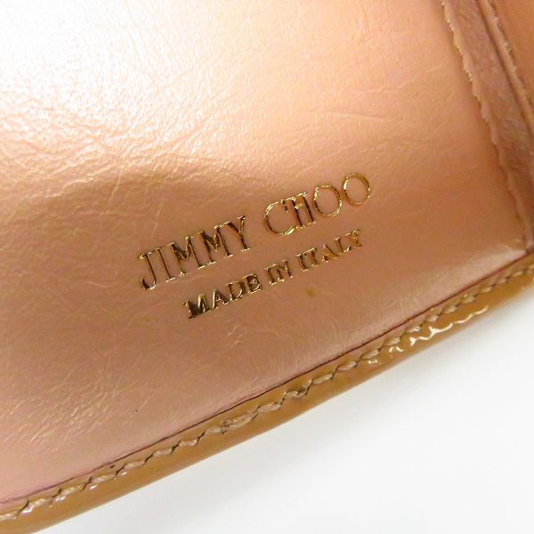 実際に弊社で買取させて頂いたJIMMY CHOO/ジミーチュウ スタースタッズ エナメルレザー 三つ折りコンパクト財布の画像 4枚目