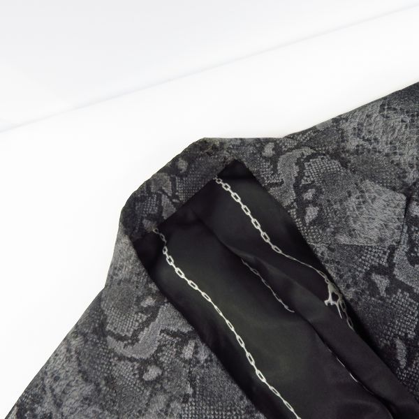 実際に弊社で買取させて頂いたBACKBONE/バックボーン 09SS パイソン柄 ピークドラぺルジャケット/Sの画像 5枚目