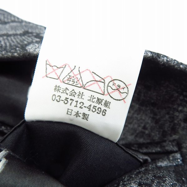 実際に弊社で買取させて頂いたBACKBONE/バックボーン 09SS パイソン柄 ピークドラぺルジャケット/Sの画像 4枚目