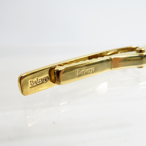 実際に弊社で買取させて頂いたBurberrys/バーバリー タイピン グリーン×ゴールドの画像 1枚目