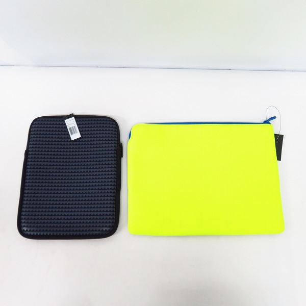 実際に弊社で買取させて頂いた【未使用】MARC BY MARC JACOBS/マークバイマークジェイコブス PCタブレットケース　M6131057/M0003953 2点セットの画像 1枚目