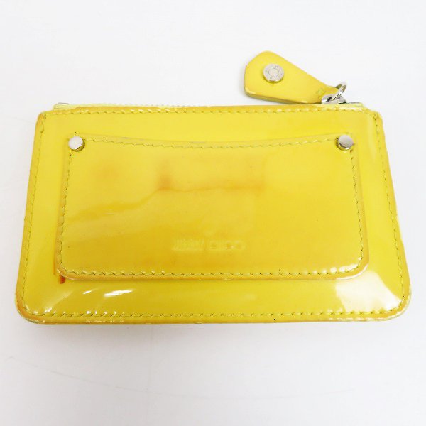 実際に弊社で買取させて頂いたJIMMY CHOO/ジミーチュウ スタースタッズ カラビナチェーン付き エナメルレザー コインケースの画像 1枚目